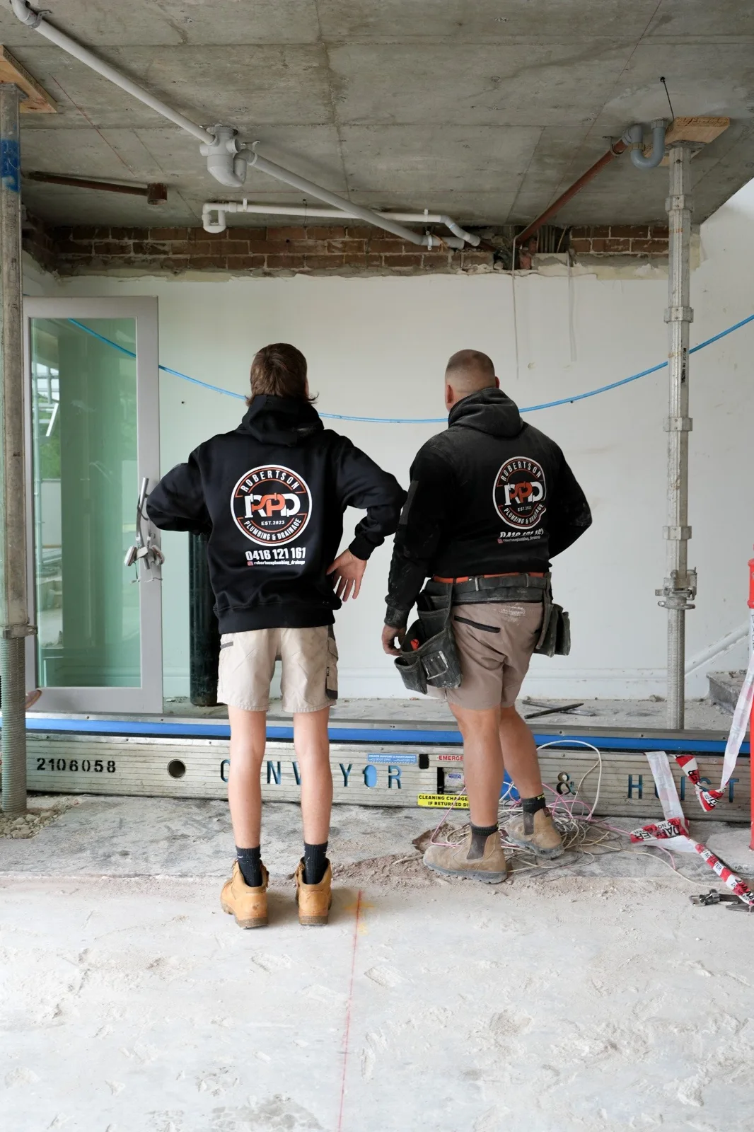 RPD team reviewing plumbing services on site
